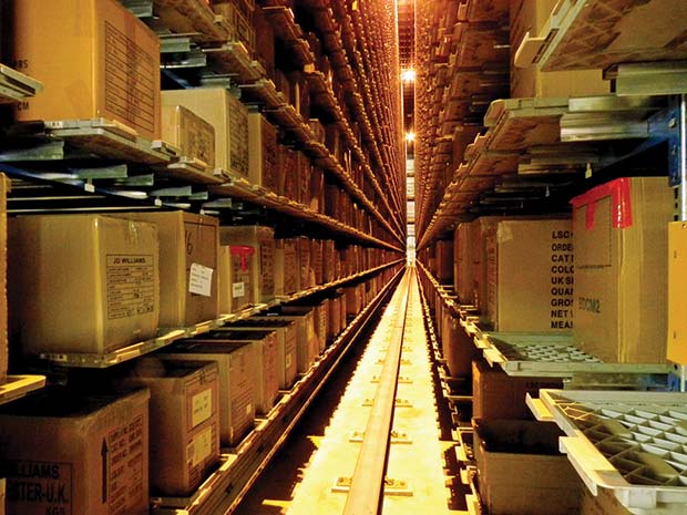 1269-1At-JD-Williams-the-automatic-crane-runs-on-the-rail-down-the-aisle-between-the-storage-racks