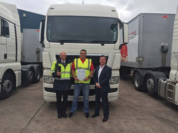Mark-Plaistow-(centre)-is-among-the-first-to-sign-up-to---Driving-Ambition_s-training-scheme.-Also-pictured-are-(left)-Peter---Tasker,-lead-examiner,-and-Adrian-Daulby,-director-of-operations