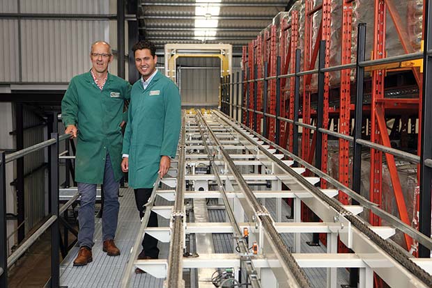 Left to Right: George Page (Production Director) and David Wilson (Operations Manager) with the new central conveying system. 